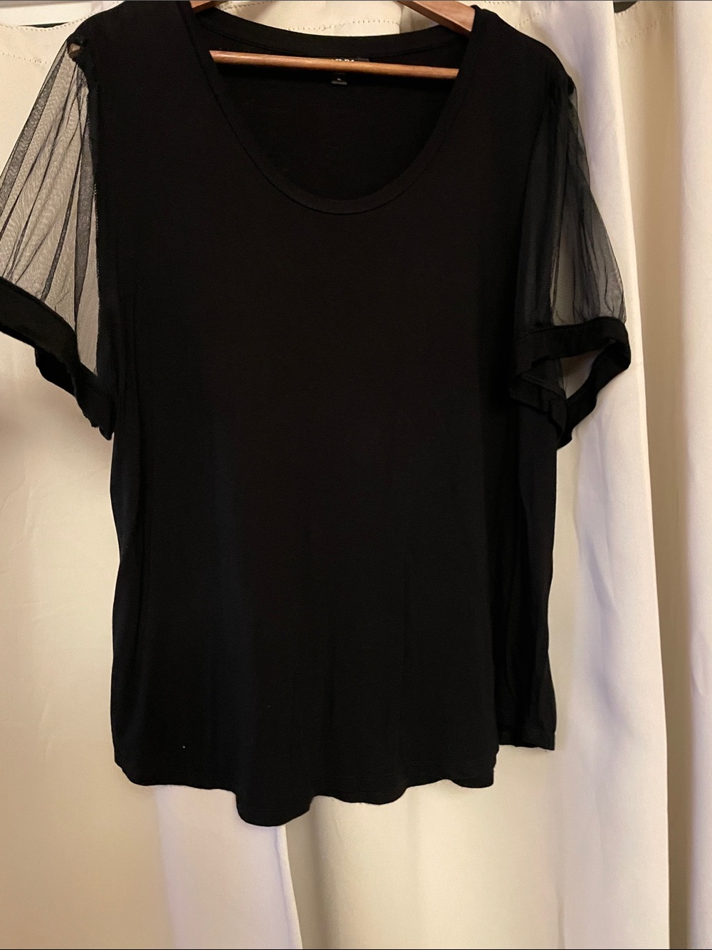 Sheer sleeve top by DKNY